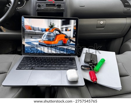 selective focus mobile workstation with laptop and notebooks inside car