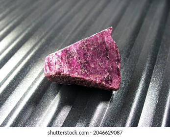 Selective Focus Natural Rough Red Ruby Gemstone For Cutting.