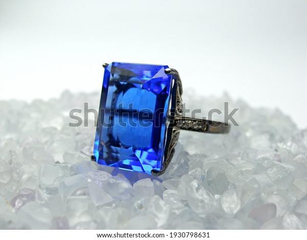 Selective focus lot of natural rough\
white sapphire gemstone for cutting and blue sapphire\
ring.