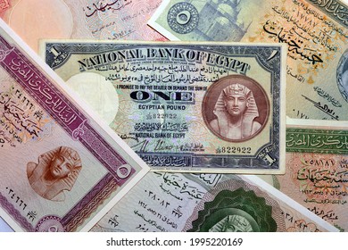 Selective focus of old Egyptian money banknotes, Leftover Egyptian pounds currency non circulating anymore, historic 10 pounds , 5 and 1 pound with an image of Pharaoh Tutankhamen and M. Ali mosque