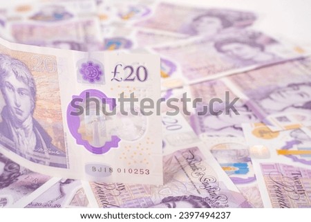 selective focus on 20 pound british bank currency note for business background