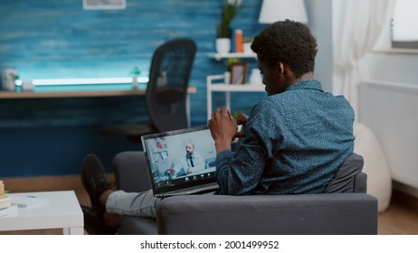 Selective Focus On African American Patient At Home Looking For Medical Help From Doctor Via Online Intenet Telehealth Consultation With Family Doctor. Health Care Checkup Via Video Virtual Conference