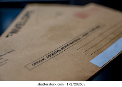 Selective Focus On Brown Official Absentee Ballot Voting Material Envelope