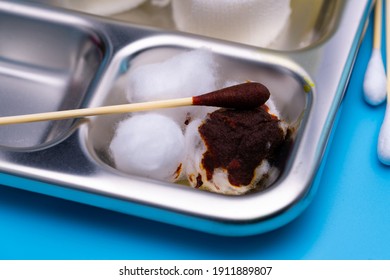 Selective Focus On Cotton Ball And Cotton Stick With Povidone-iodine For Wounds, Burns And Cuts. Wound Care Dressing Set And Stainless Steel Plate. Wound Care Supplies. Medical Equipment For Nurse.