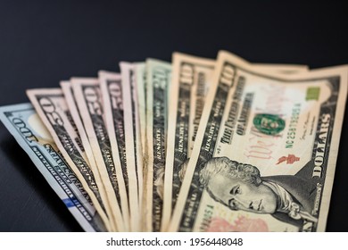 Selective Focus On Detail Of USD Banknotes. Detail Of United States Currency USD Banknotes. World Money Concept, Inflation And Economy Concept