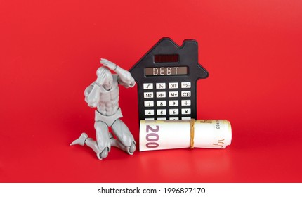 Selective focus on the doll feeling depress due to the debt that has been hit. Financial Debt Concept. 