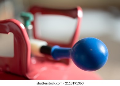 Selective Focus On Edge Of An Inflatable Balloon Attached To A Helium Canister.