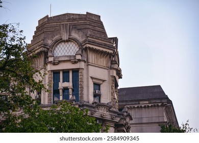 Selective focus on the facade of an old building with intricate details.