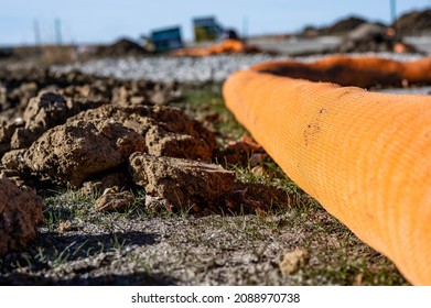 Selective Focus On Filter Sock Around Exposed Dirt At A Construction Site To Prevent Stormwater Erosion And Runoff 