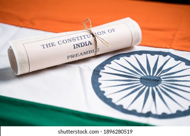Selective focus on flag, Indian constitution or Bharatiya Savidhana preamble old scattered text paper placed on Indian flag - Concept of Freedom, Nationality and patriotism - Shutterstock ID 1896280519