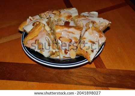 Selective focus on the front row of tasty almond kringle. The Danish treat is a local favorite in Wisconsin. 