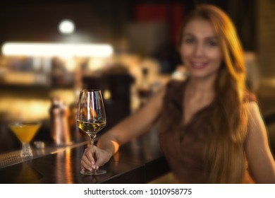 Selective Focus On A Glass Of Wine Beautiful Woman Is Holding While Enjoying The Evening At The Bar Copyspace Drinker Drinking Alcohol Elegance Grace Leisure Weekend Lifestyle Femininity Booze