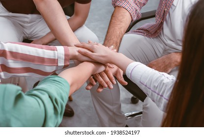 Selective Focus On Hands Put Together To Show About Unity, Teamwork, Power And Success. Working And Business Concept.