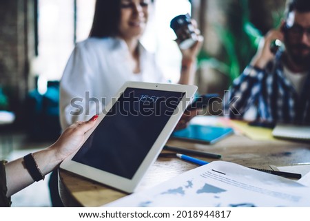Selective focus on modern blank digital gadget with copy space area for internet web advertising, unrecognizable female using pda palmtop technology with mock up touchscreen and displayed time