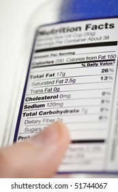 selective focus on a nutrition facts label isolated against white background