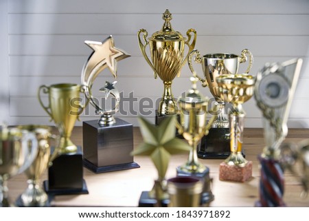 selective focus on one trophy with other trophies as background                  
