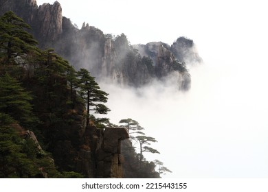 Selective focus on silhouette rock stone in dirty fog dark light. Contain some grain or noise and soft focus in low light. - Shutterstock ID 2215443155