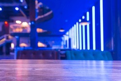 Selective Focus On The Table Board Of A Restaurant Nightclub Modern Design Background In Neon Blue Light.