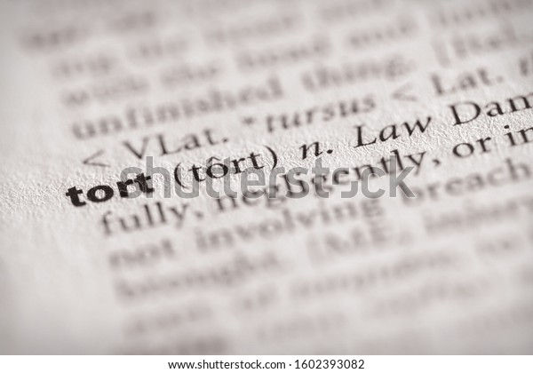 Selective focus on the word “tort”. Many more\
word photos in my\
portfolio.