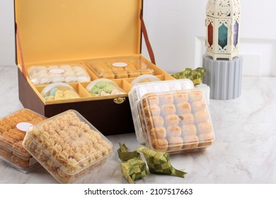 Selective focus  Parcel Hampers Gift on Assorted Indonesian Cookies for Eid al Fitr.  - Shutterstock ID 2107517663