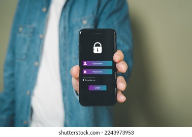 Selective focus at people hand while using smartphone to type password credential to login to Internet wireless connection at home. Network security of internet access into router with futuristic icon