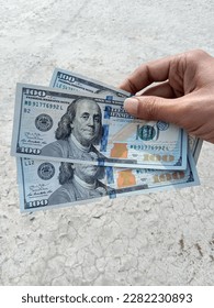 selective focus photo of American dollars  - Shutterstock ID 2282230893