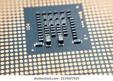selective focus photo, the back of a processor with pins and transistors