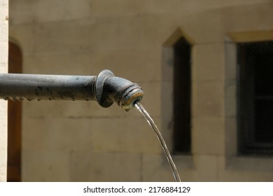 Selective Focus Picture With Noise Effect Of Free Flow Clean Water Source At Zurich Public Area.