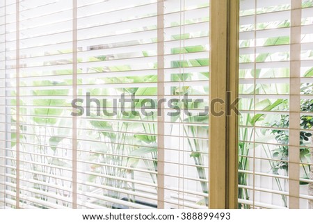 Selective focus point on Blinds window decoration in livingroom interior - Vintage Light Filter