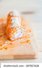 Selective focus point on Salmon sushi roll , traditional japanese food style