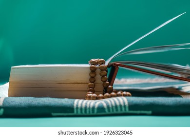 Selective Focus Prayer Beads On The Koran,ramadan Concept