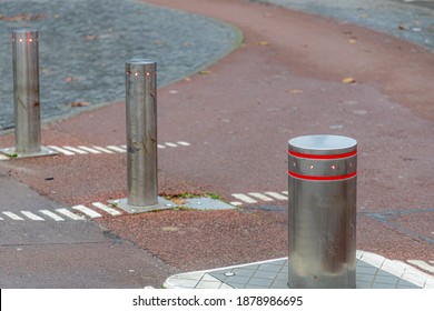 Selective Focus Of Retractable Electric Bollard Metallic On Street, Aluminum Obstacle Blocking Access In A Road, Automatic Pillar For Fencing The Roads, Hydraulic For The Control Of Road Traffic.