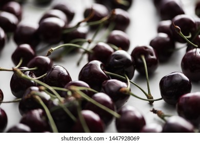 selective focus of ripe, fresh, whole and sweet cherries