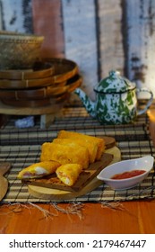 Selective Focus Risoles Sosis Mayo (American Risoles) Or Mayonnaise Sausage Rissole Is A Small Patty Rolled In Breadcrumbs. It Is Filled With Mayonnaise, Boiled Egg And Sausage. Served On White Plate.