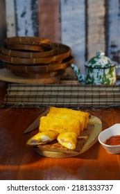 Selective Focus Risoles Sosis Mayo (American Risoles) Or Mayonnaise Sausage Rissole Is A Small Patty Rolled In Breadcrumbs. It Is Filled With Mayonnaise, Boiled Egg And Sausage. Served On White Plate.