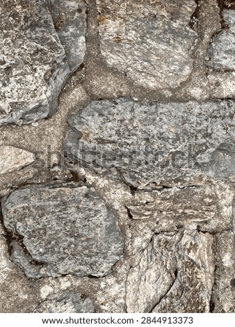 selective focus rustic stonework texture on an old wall