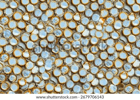 Selective focus of rusty crown cap. 