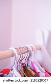 Selective Focus Shallow Depth Of Field, Children's Costumes Of Many Colors And Shapes With Their Accessories Hanging On A Coat Rack