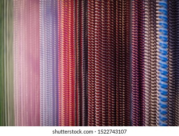 Selective focus. shape of rotating plastic strap multicolour