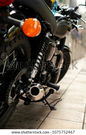 Similar – Senior man steering motorcycle on road