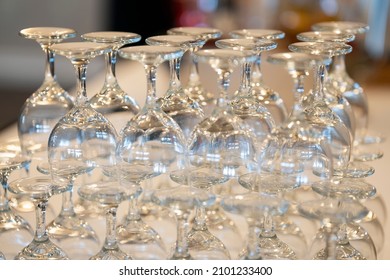 A Selective Focus Shot Of Glasses Stacked Upside-down