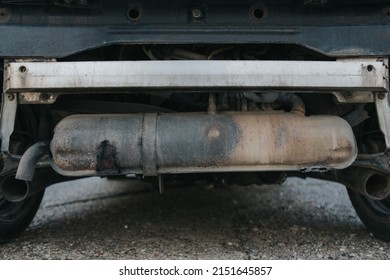 A Selective Focus Shot Of An Old Vehicle Exhaust System