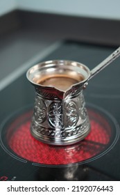 A selective focus shot of Traditional Turkish Coffee made with Cezve