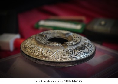 A Selective Focus Shot Of A Vintage Ashtray Wi