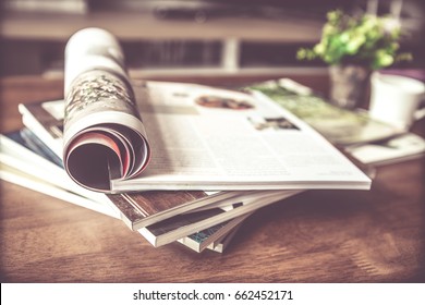 selective focus of the stacking magazine place on table in living room - Shutterstock ID 662452171