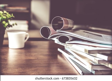 selective focus of the stacking magazine place on table in living room - Powered by Shutterstock