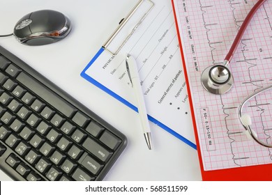 Selective Focus Stethoscope And Medical Chart On The Nurse Station In The Hospital. Red Stethoscope.