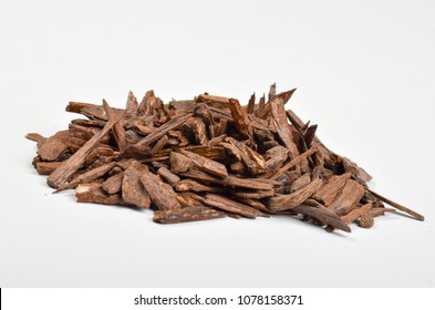 Selective Focus, Sticks Of Agar Wood Or Agarwood Background. The Incense Chips Used By Burning For Incense & Perfumes Of Essential Oil As Oud Or Bakhoor
