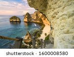 (Selective focus) Stunning view of the Diamond Beach bathed by a turquoise sea during sunrise. Diamond Beach is an untouched, white-sand and silky blue water bay on the eastern tip of Nusa Penida.