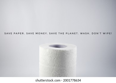 Selective Focus Top Of A Roll Of Kitchen Towel Tissue Isolated With White Background With Quotes 'Save Paper. Save Money. Save Our Planet. Wash. Don't Wipe!' With Black Color Letter.